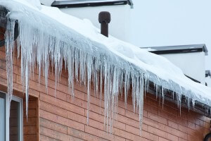 bigstock Winter Hanging Icicles on the roof