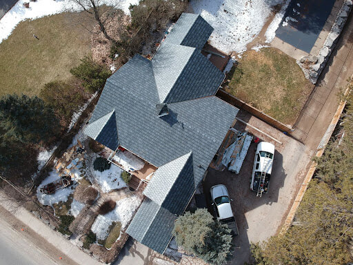 birds eye view of home with new roof